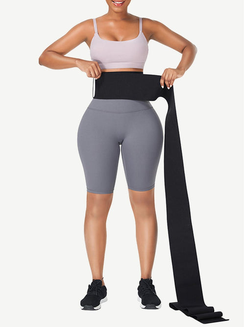 Model wrapping black elastic compression bandage around waist